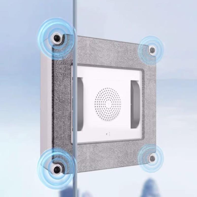 Robot limpiacristales fixé sur une vitre grâce à ses ventouses et des capteur pour detecter les bords